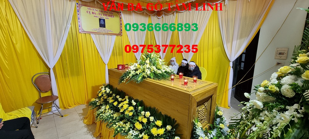quan tài gỗ vàng tâm